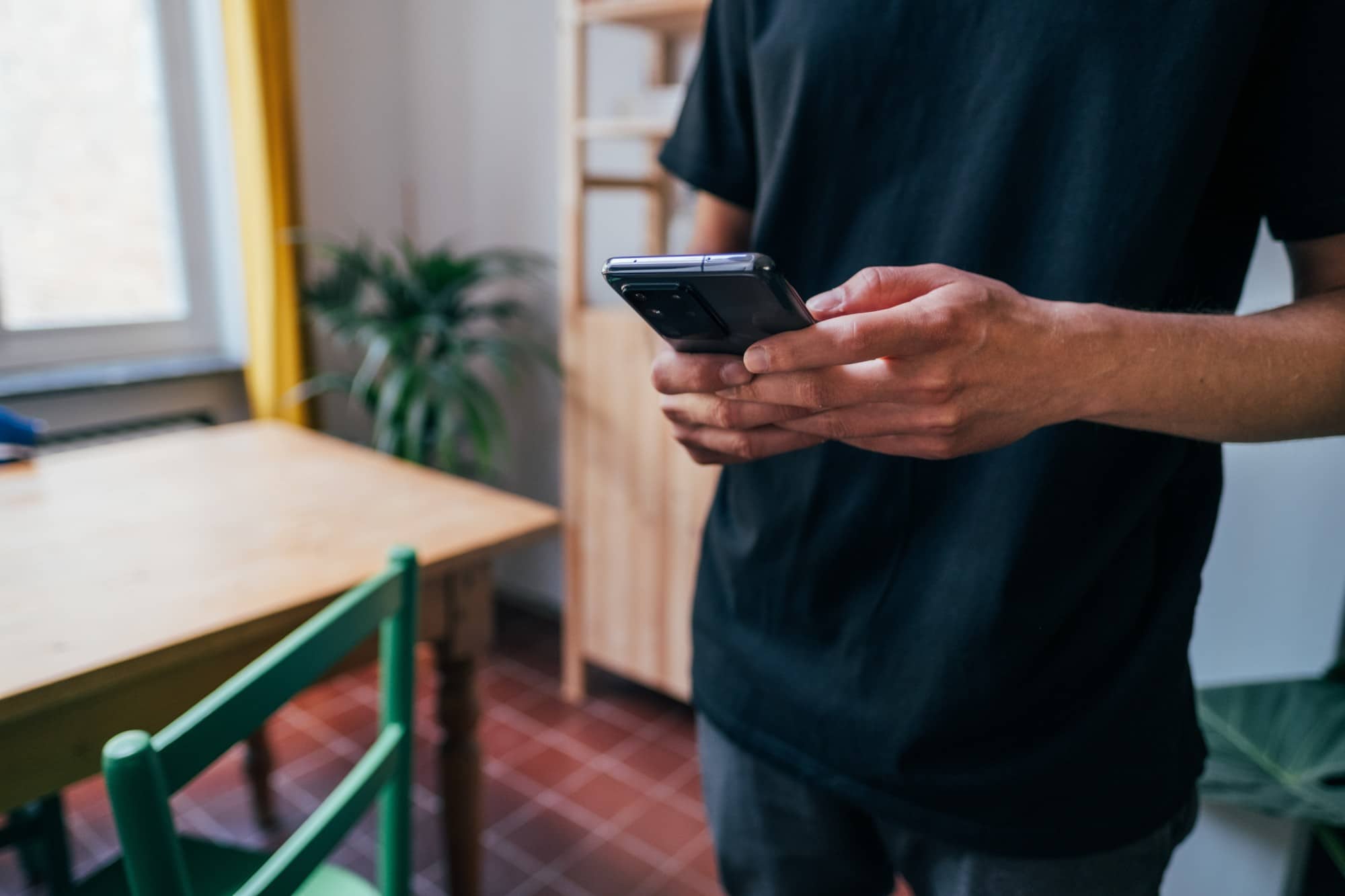 A man using a Samsung smartphone